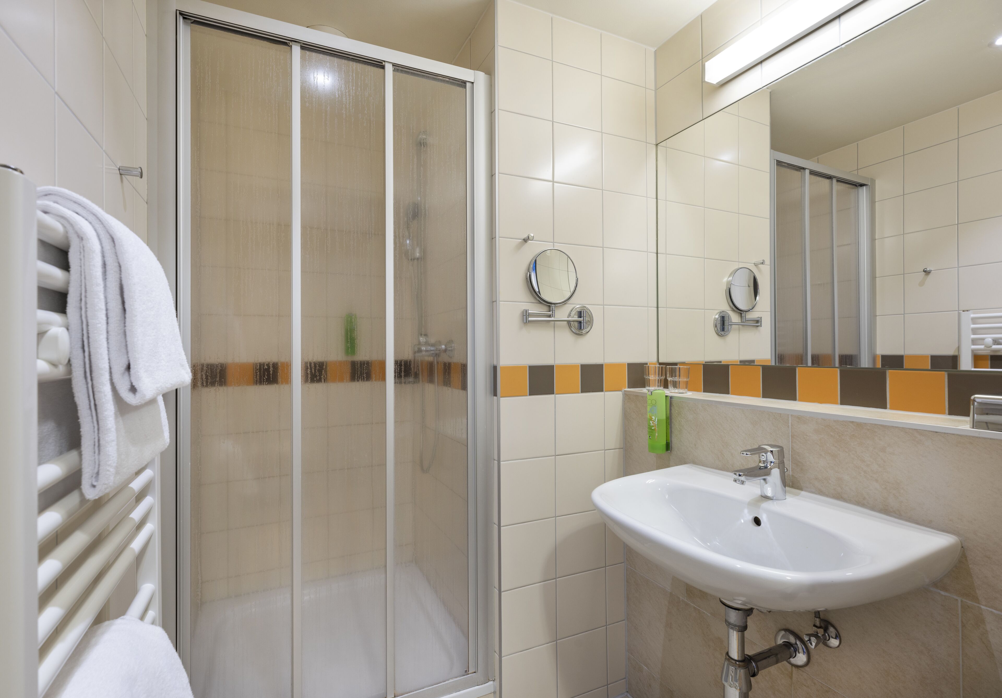 basic quadruple room | bathroom | shower, hair dryer, towels