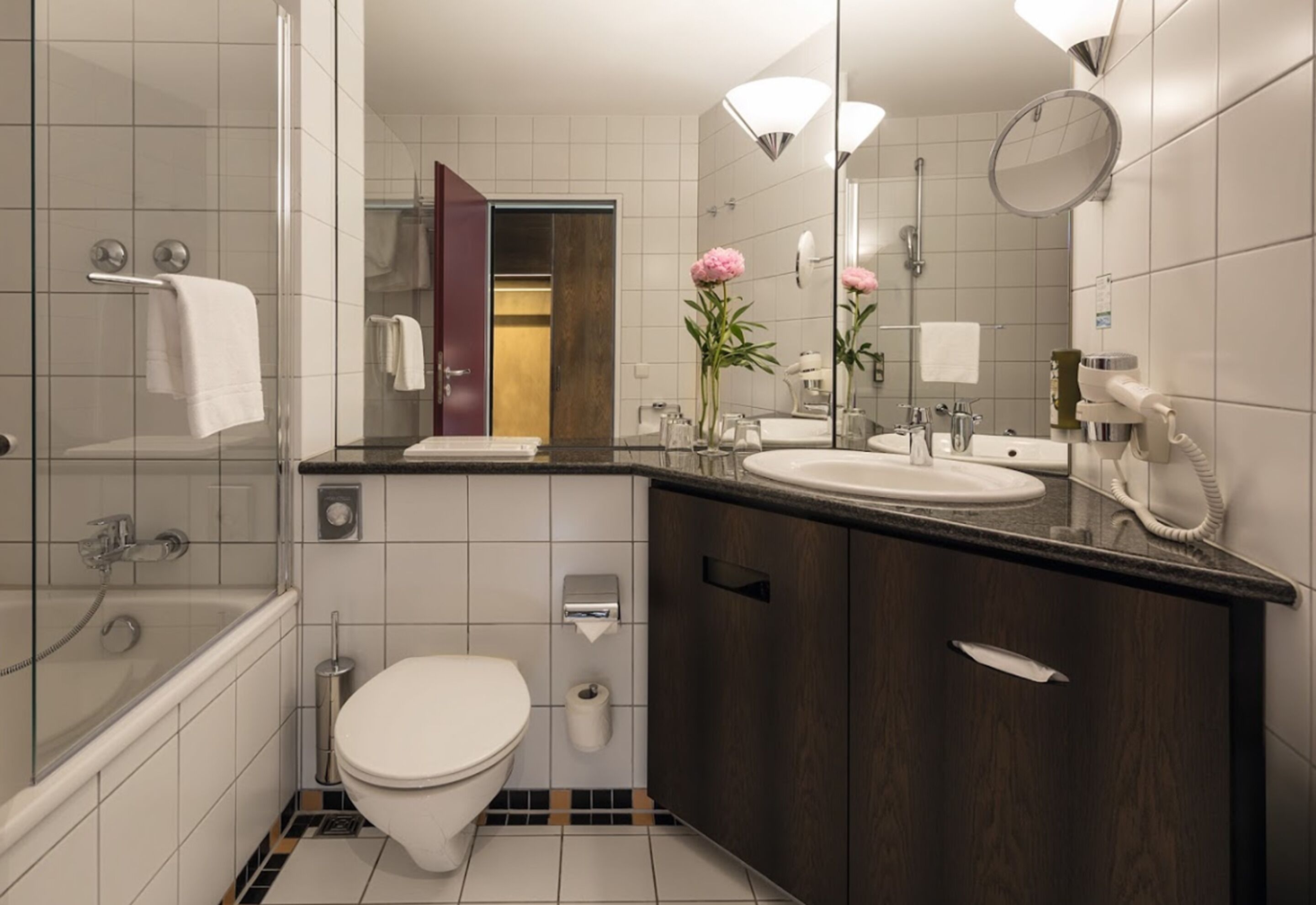 eco-friendly toiletries, hair dryer, towels, soap