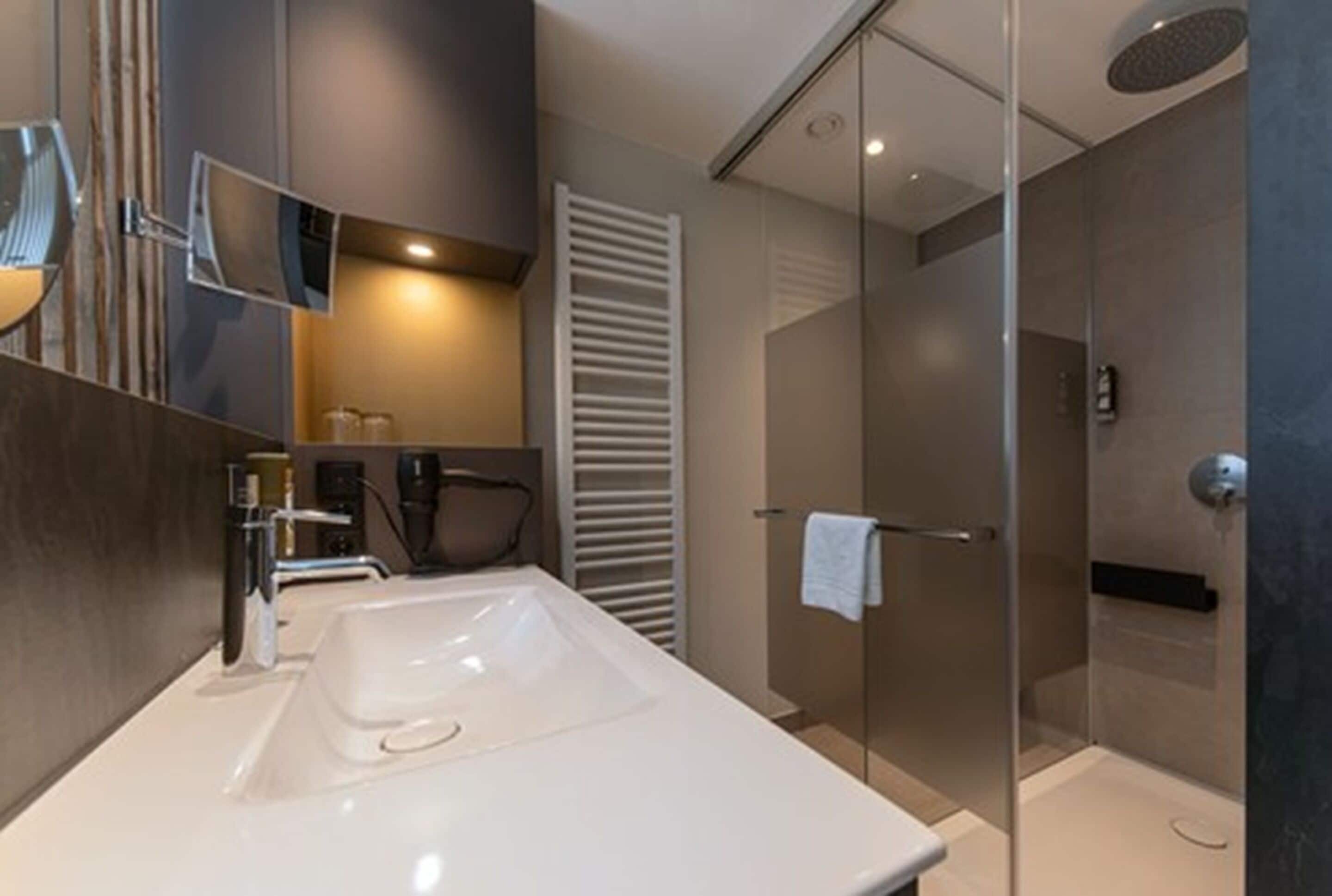 eco-friendly toiletries, hair dryer, towels, soap