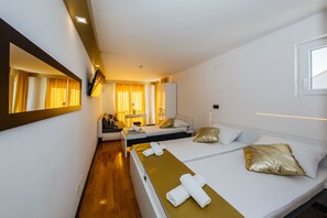 Desk, blackout curtains, free WiFi, bed sheets