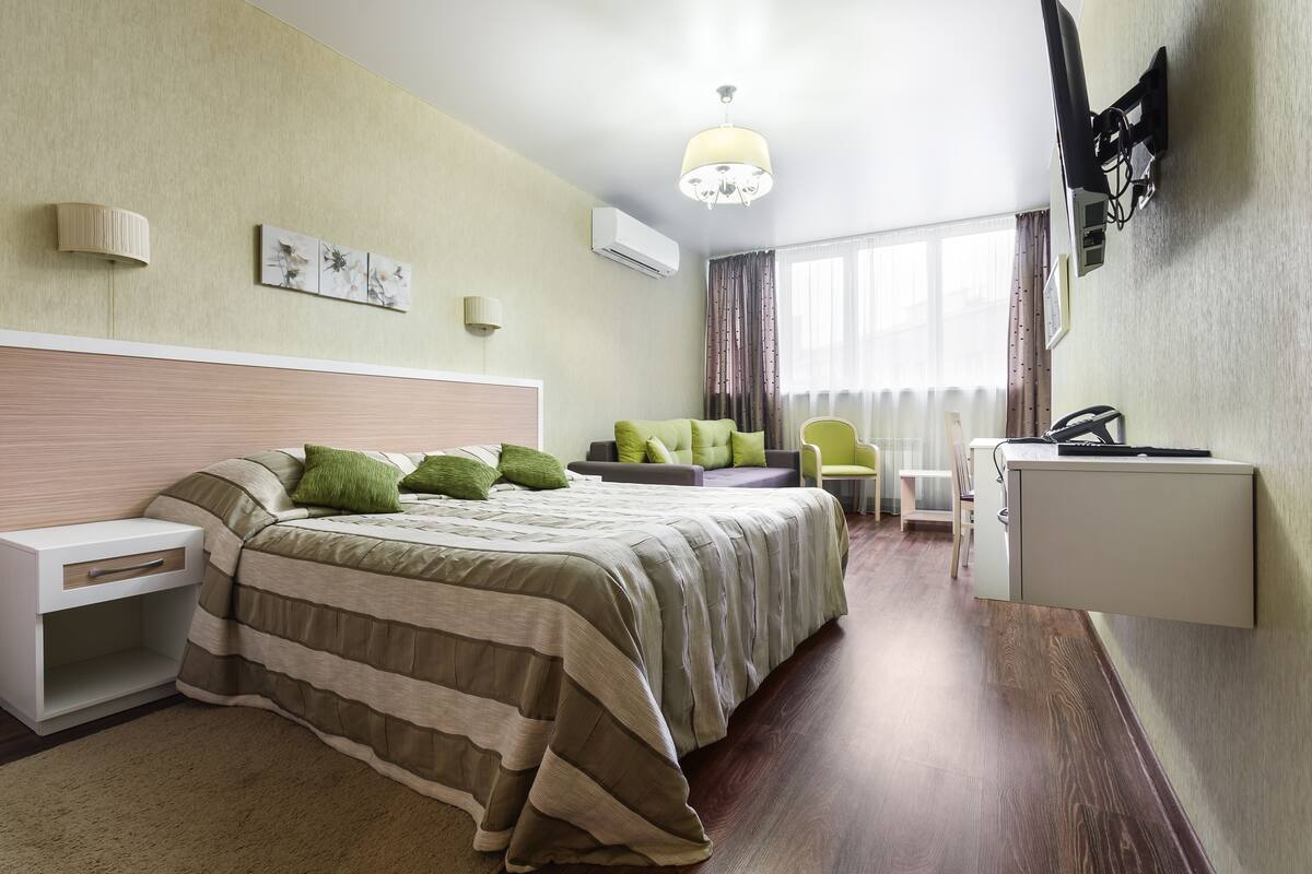 Apartamento empresarial, 1 quarto, cozinha | Roupas de cama premium, frigobar, cofres nos quartos, escrivaninha