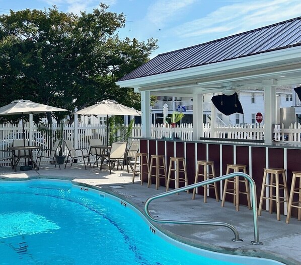 Seasonal outdoor pool, open 10:00 AM to 8:00 PM, sun loungers