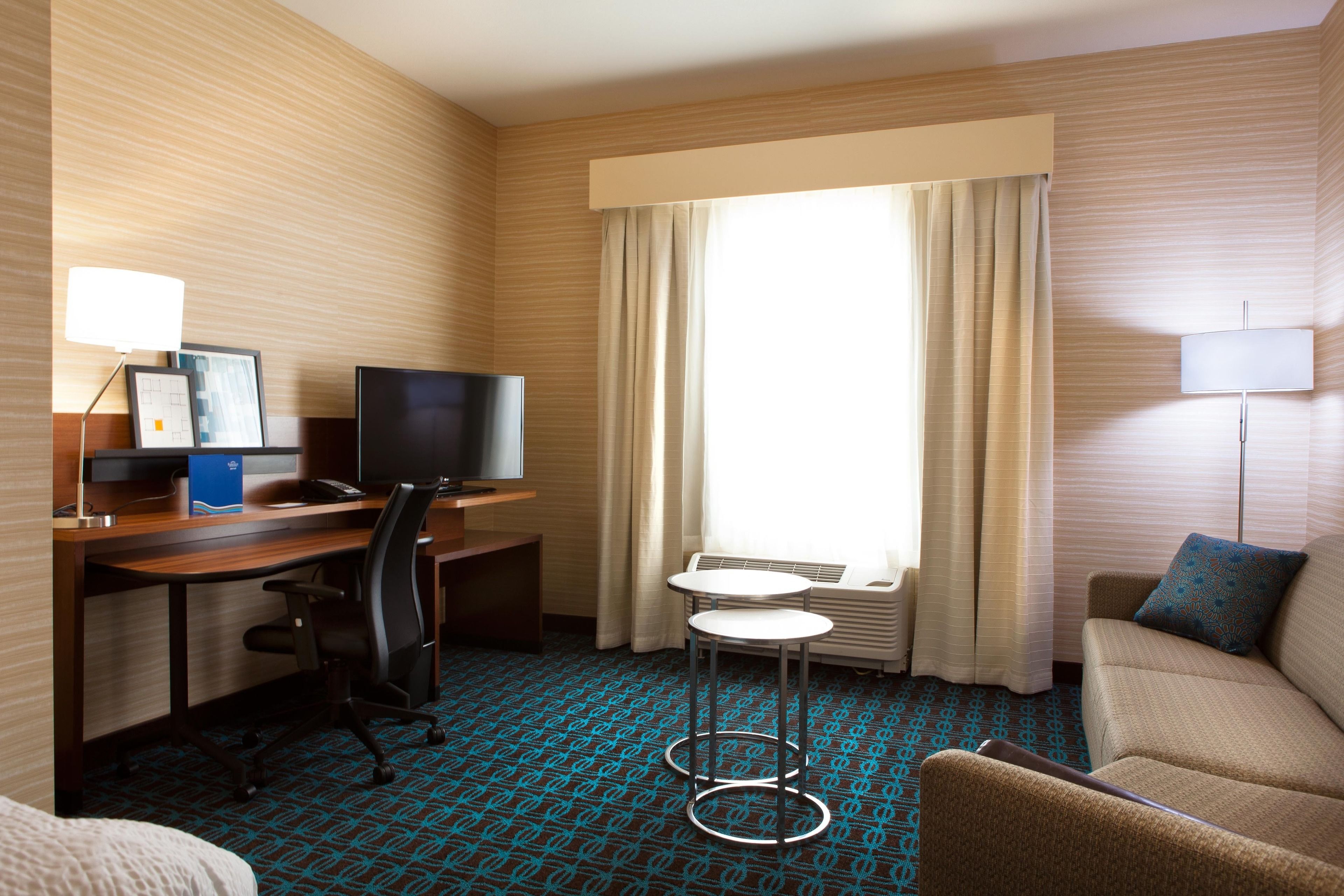 suite, 1 king bed with sofa bed | living area | smart tv, netflix