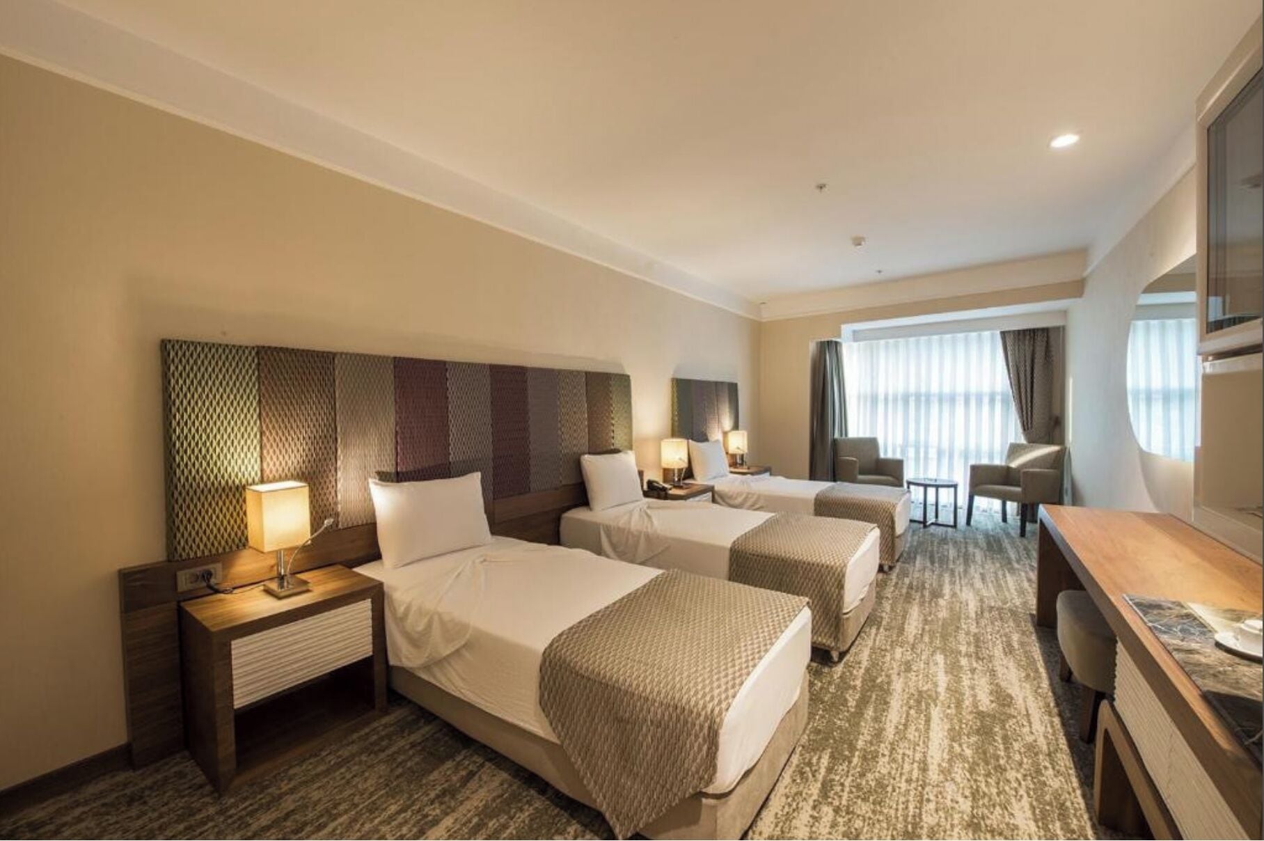 triple room, smoking | minibar, in-room safe, desk, blackout curtains