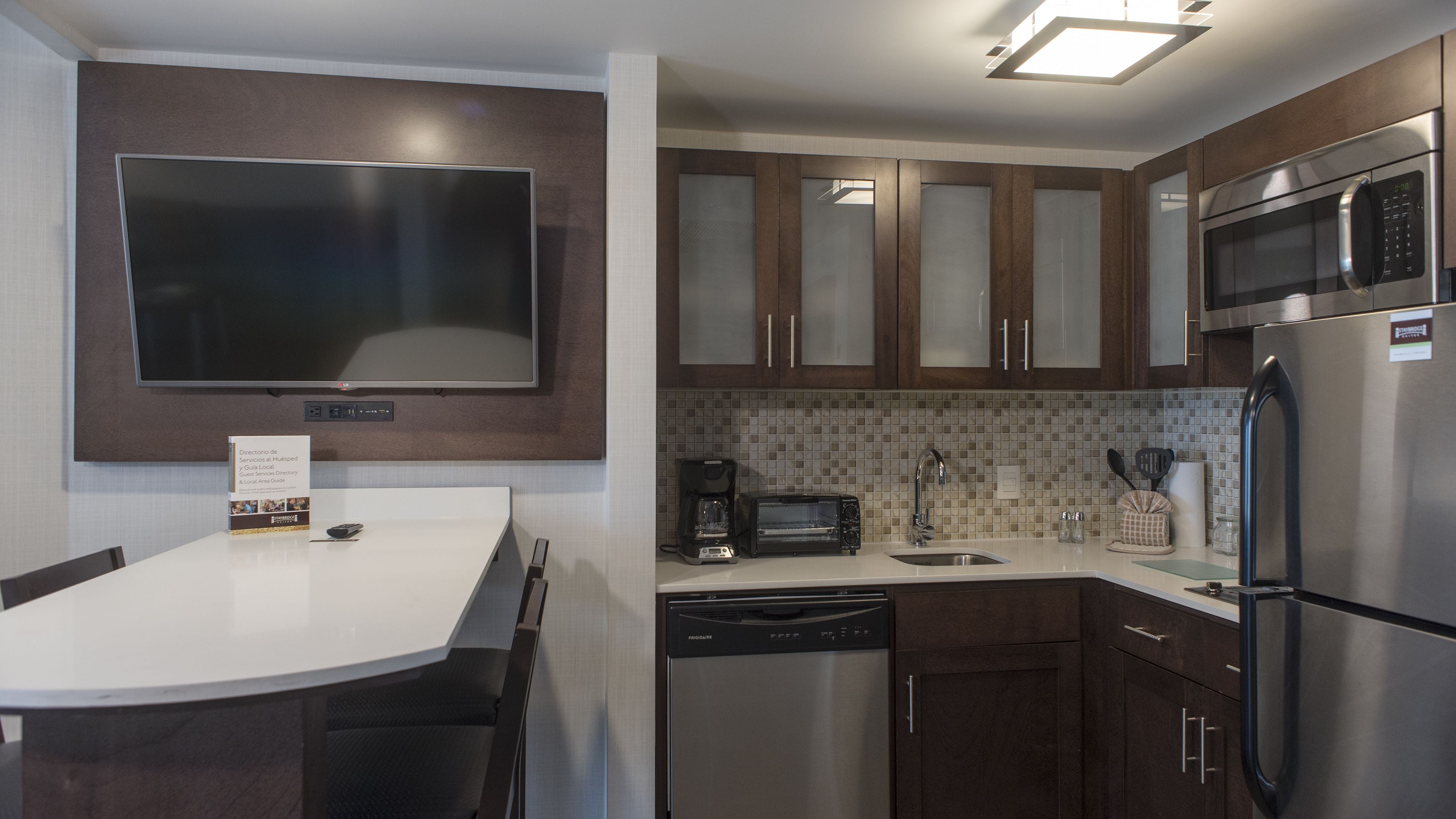 suite, 1 bedroom, kitchen, mountain view | private kitchen | full-sized fridge, coffee/tea maker, cookware/dishes/utensils