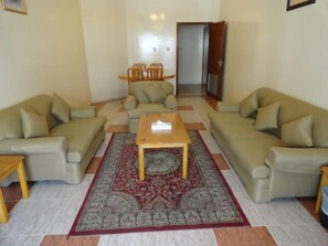 Apartment, 1 Schlafzimmer | Wohnbereich | Fernseher