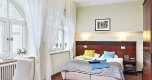 Premium bedding, in-room safe, desk, soundproofing