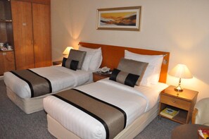 Ropa de cama de alta calidad y minibar 