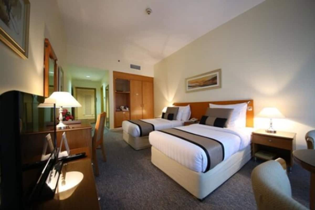 Standaard Twin kamer | Luxe beddengoed, een minibar, een kluis op de kamer, een bureau