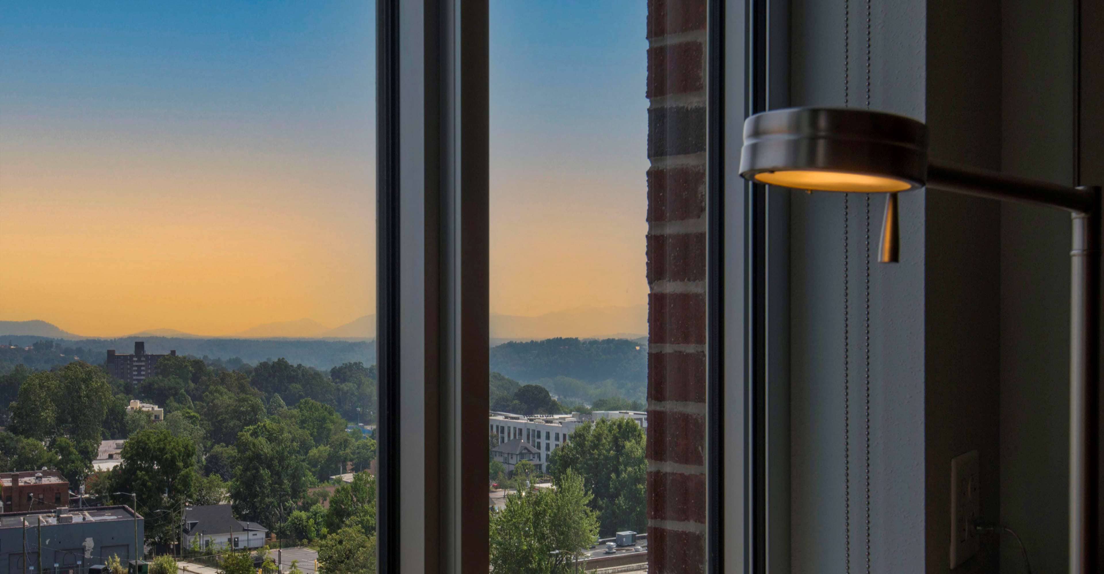 room, 1 king bed, city view, corner | view from room