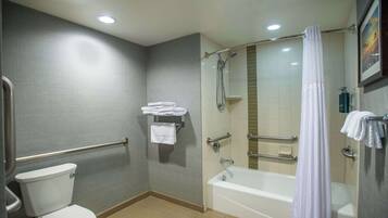 Designer toiletries, hair dryer, towels