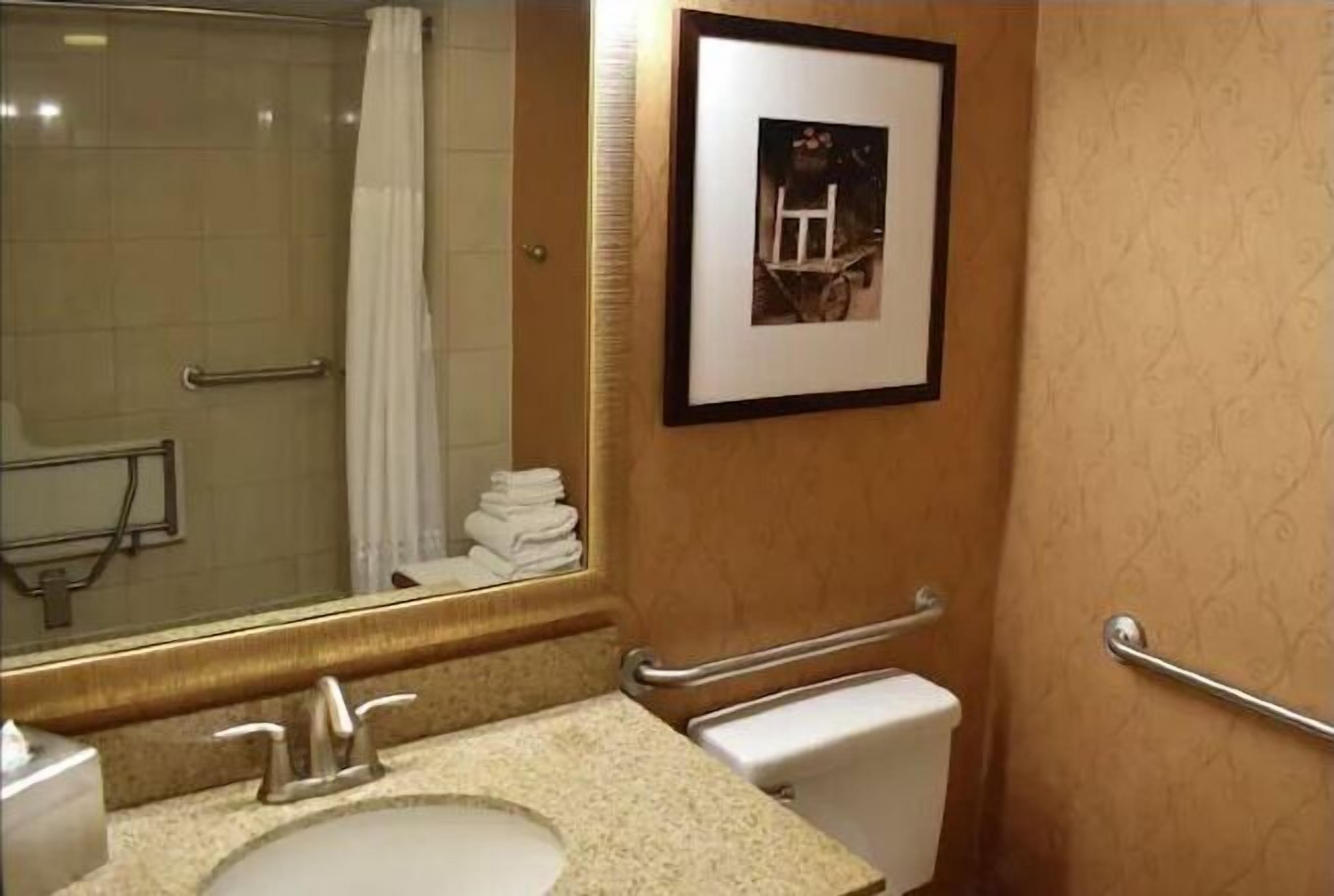 Bathroom | Designer toiletries, hair dryer, towels