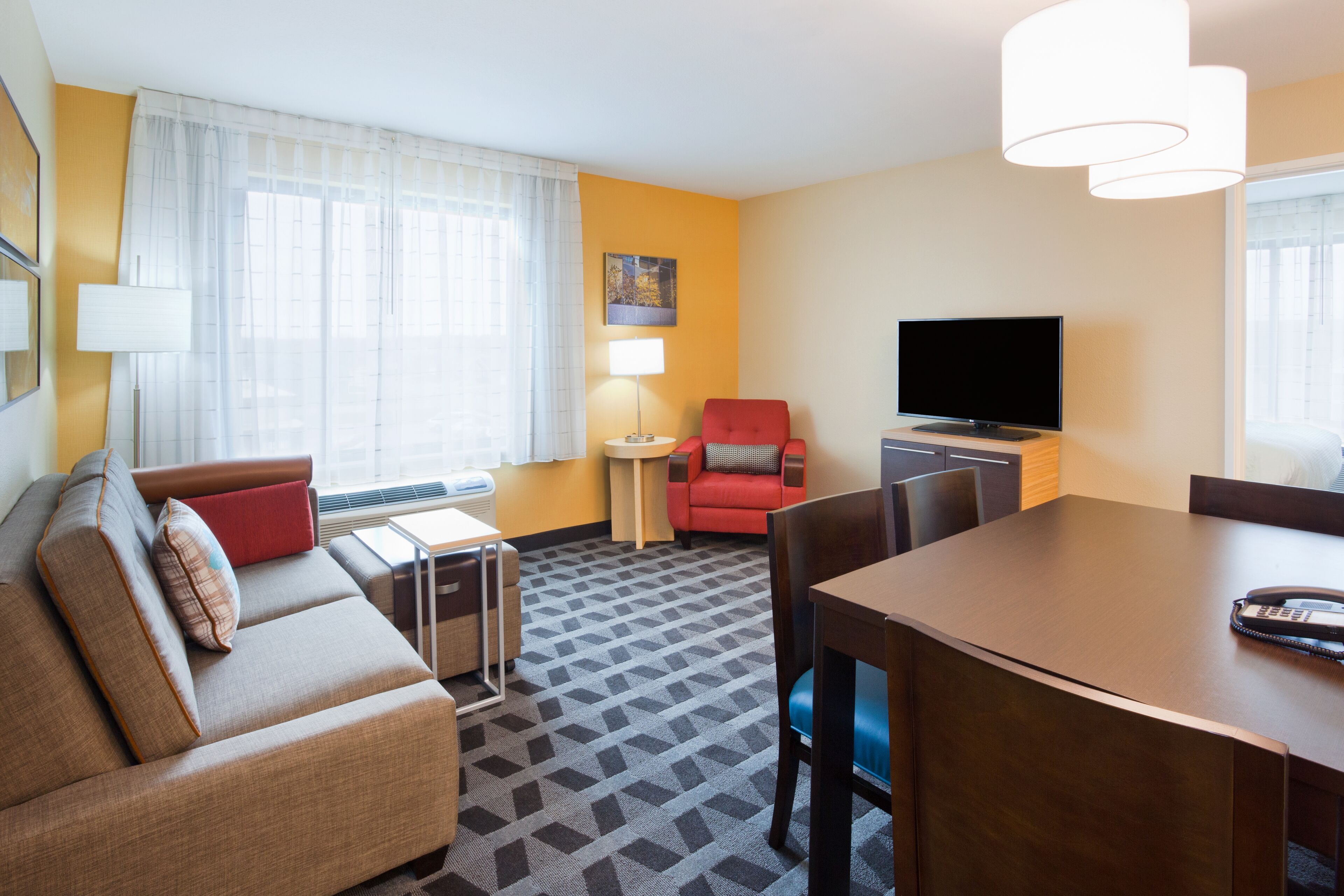 desk, laptop workspace, iron/ironing board, free cots/infant beds