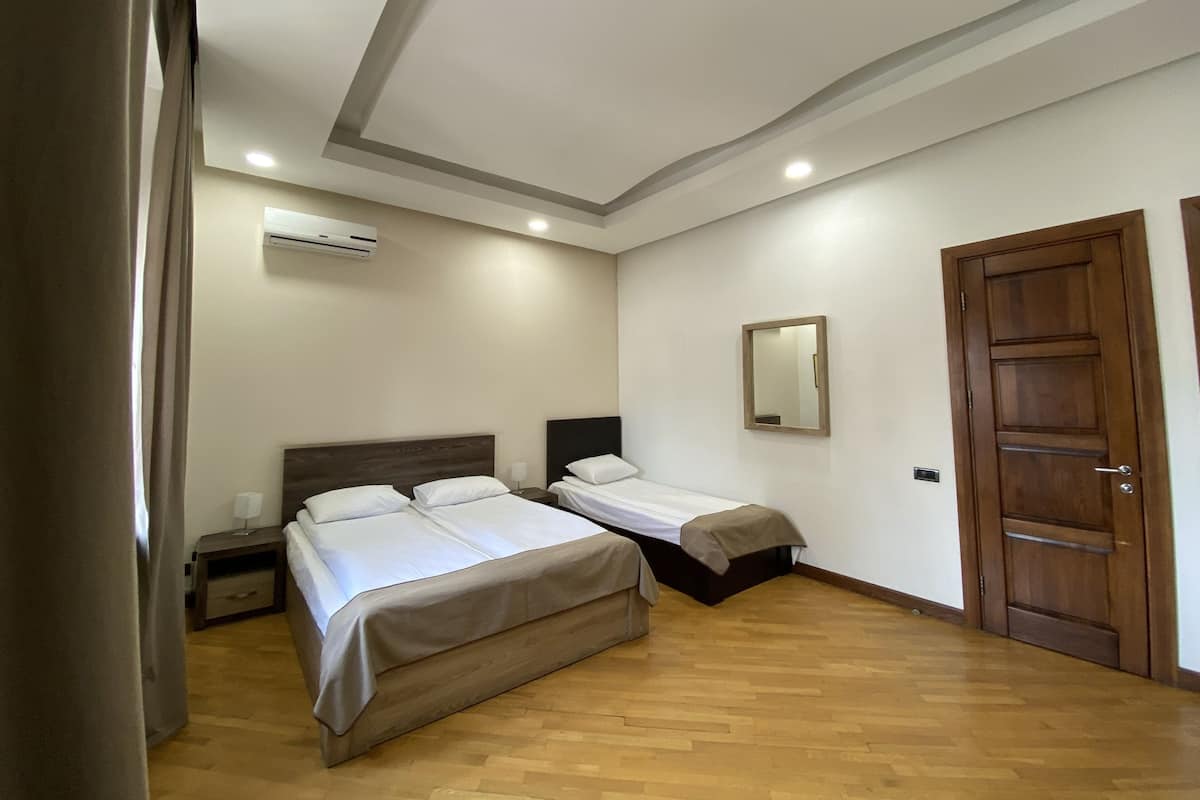 Standard Triple Room, Non Smoking, City View | 1 bedroom, desk, iron/ironing board, rollaway beds