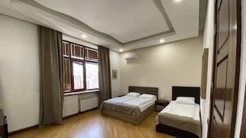 Standard Triple Room, Non Smoking, City View | 1 bedroom, desk, iron/ironing board, rollaway beds