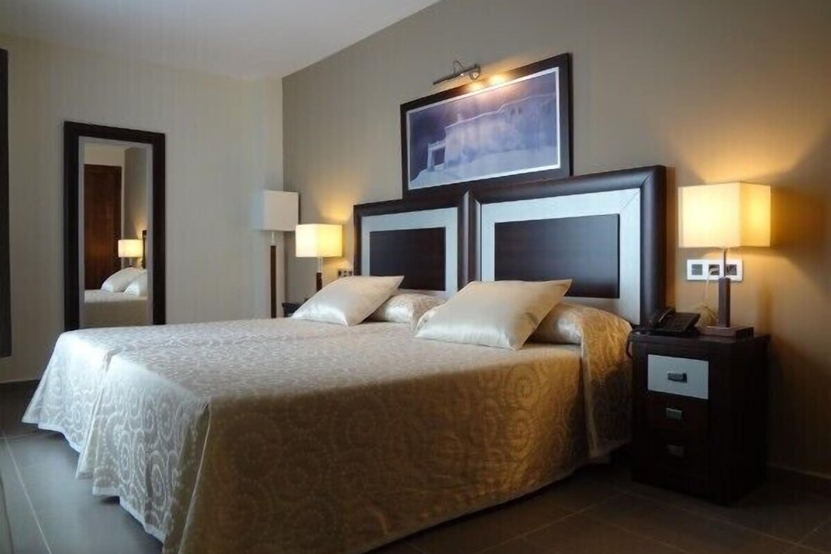 Desk, laptop workspace, blackout curtains, free WiFi