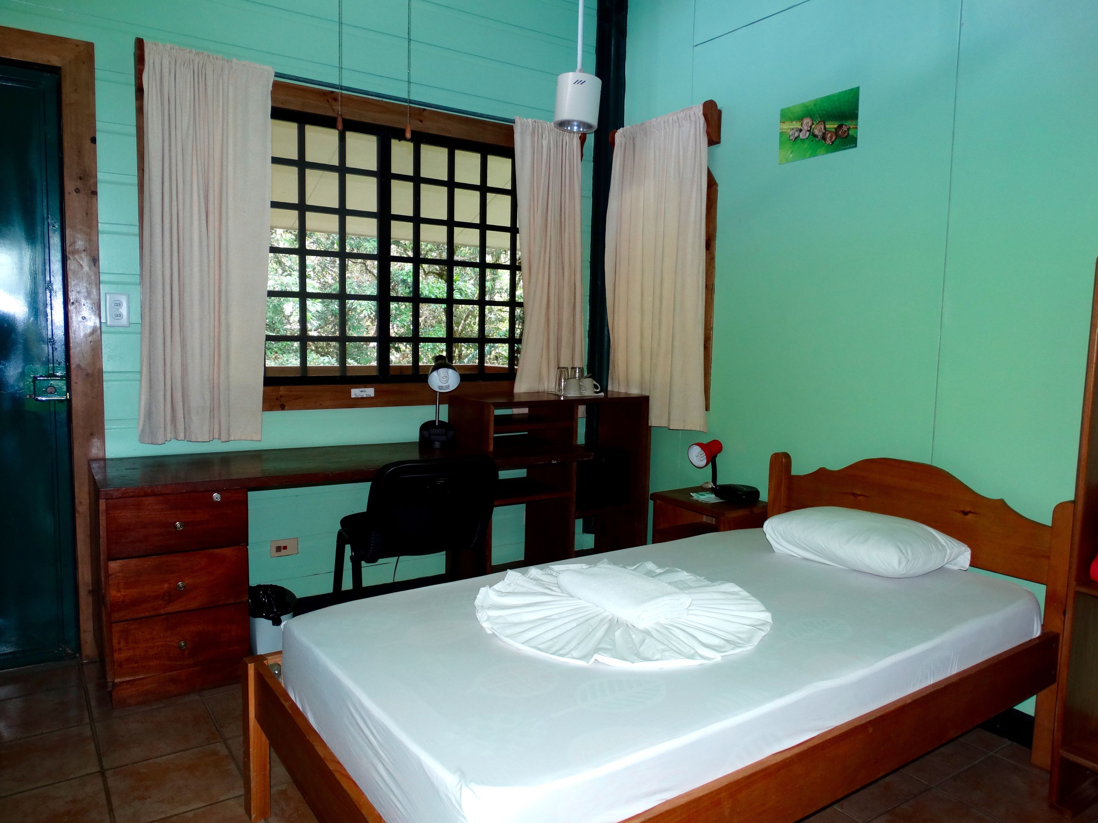 double room, garden view | in-room safe, desk, free wifi