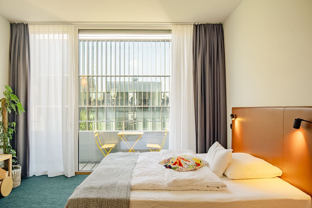Deluxe Balcony Room | In-room safe, individually decorated, individually furnished, desk