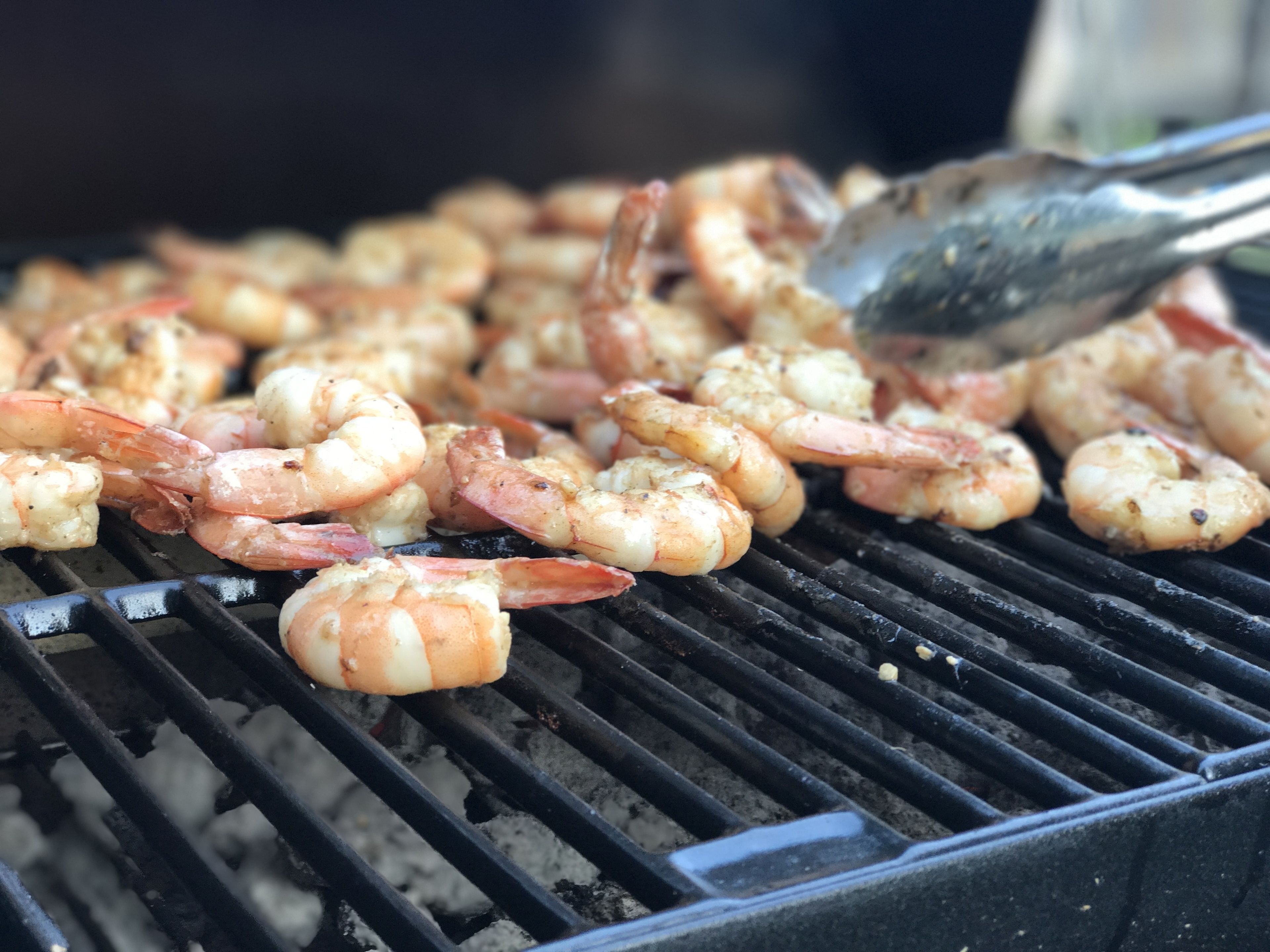 Grilled shrimp on a grill.