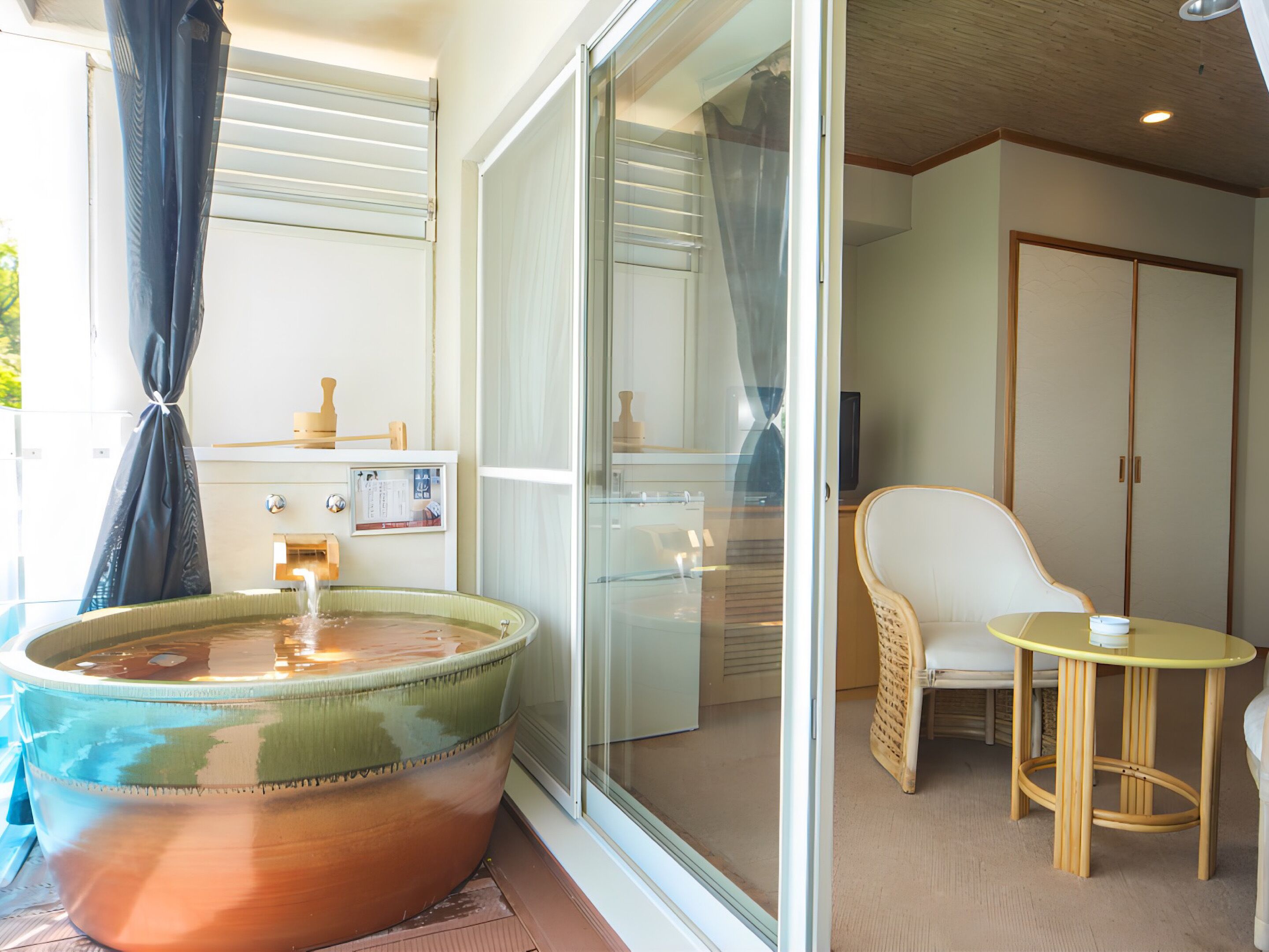 Combined shower/tub, designer toiletries, hair dryer, slippers