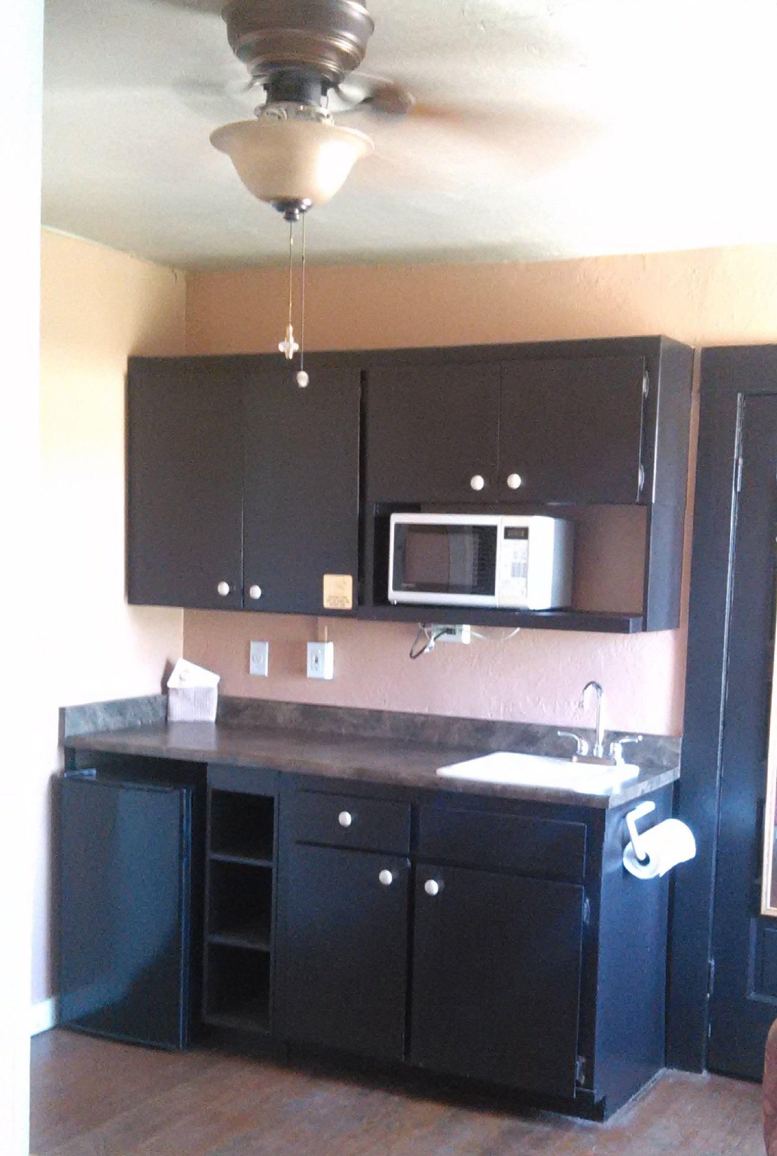 classic studio suite, 1 queen bed | private kitchenette | fridge, microwave, coffee/tea maker