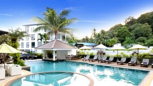 Outdoor pool, pool umbrellas, sun loungers