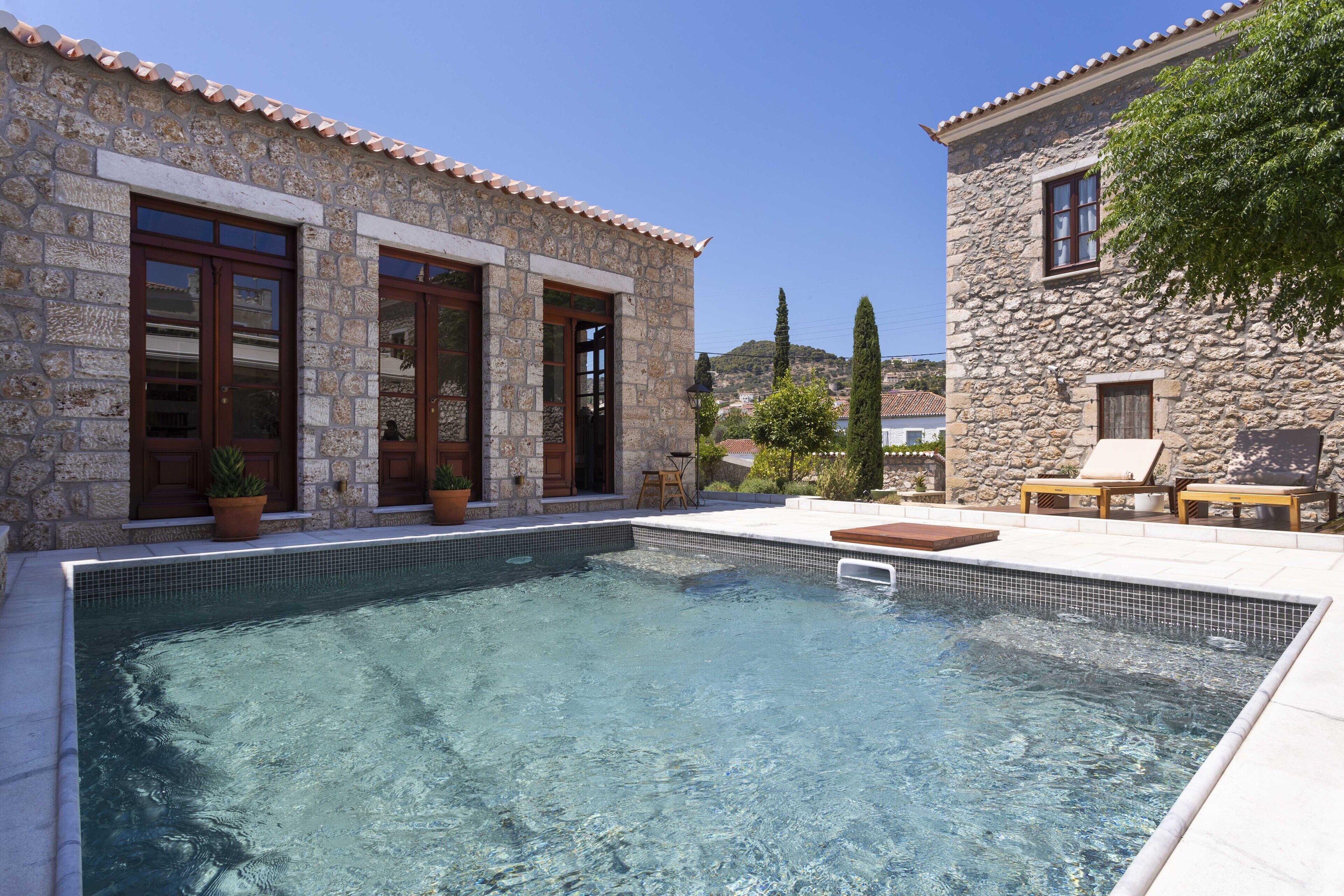 Outdoor pool, open 9:00 AM to 8:00 PM, sun loungers