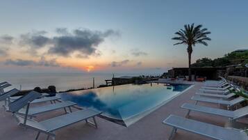 2 outdoor pools, pool umbrellas, sun loungers