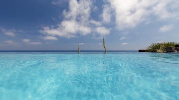 2 outdoor pools, pool umbrellas, pool loungers