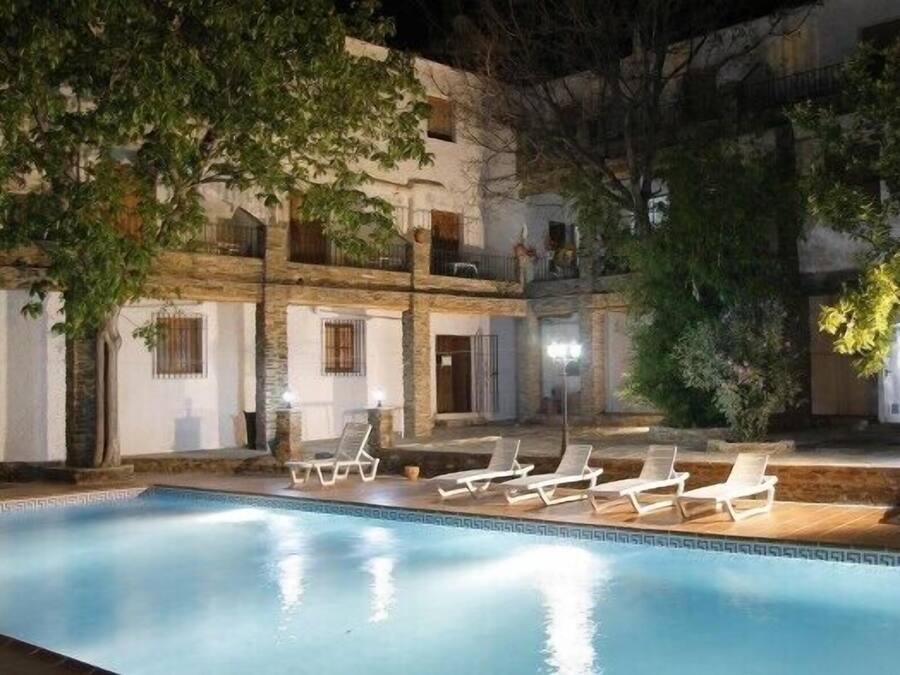 Seasonal outdoor pool, open 11:00 AM to 9:00 PM, pool loungers