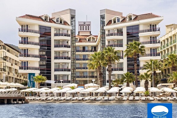 Indoor pool, outdoor pool, pool umbrellas, sun loungers