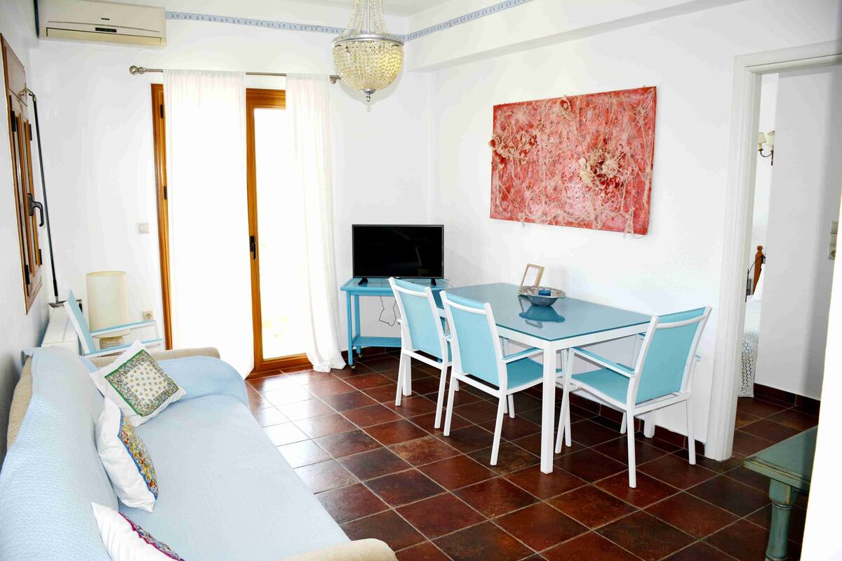 Apartment, 1 Bedroom | Living area | 32-inch TV with digital channels