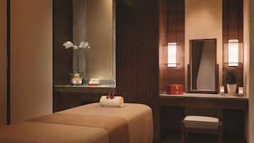 Enjoy a restful stay in this stylishly designed room featuring a comfortable bed, a sink, and a convenient countertop.