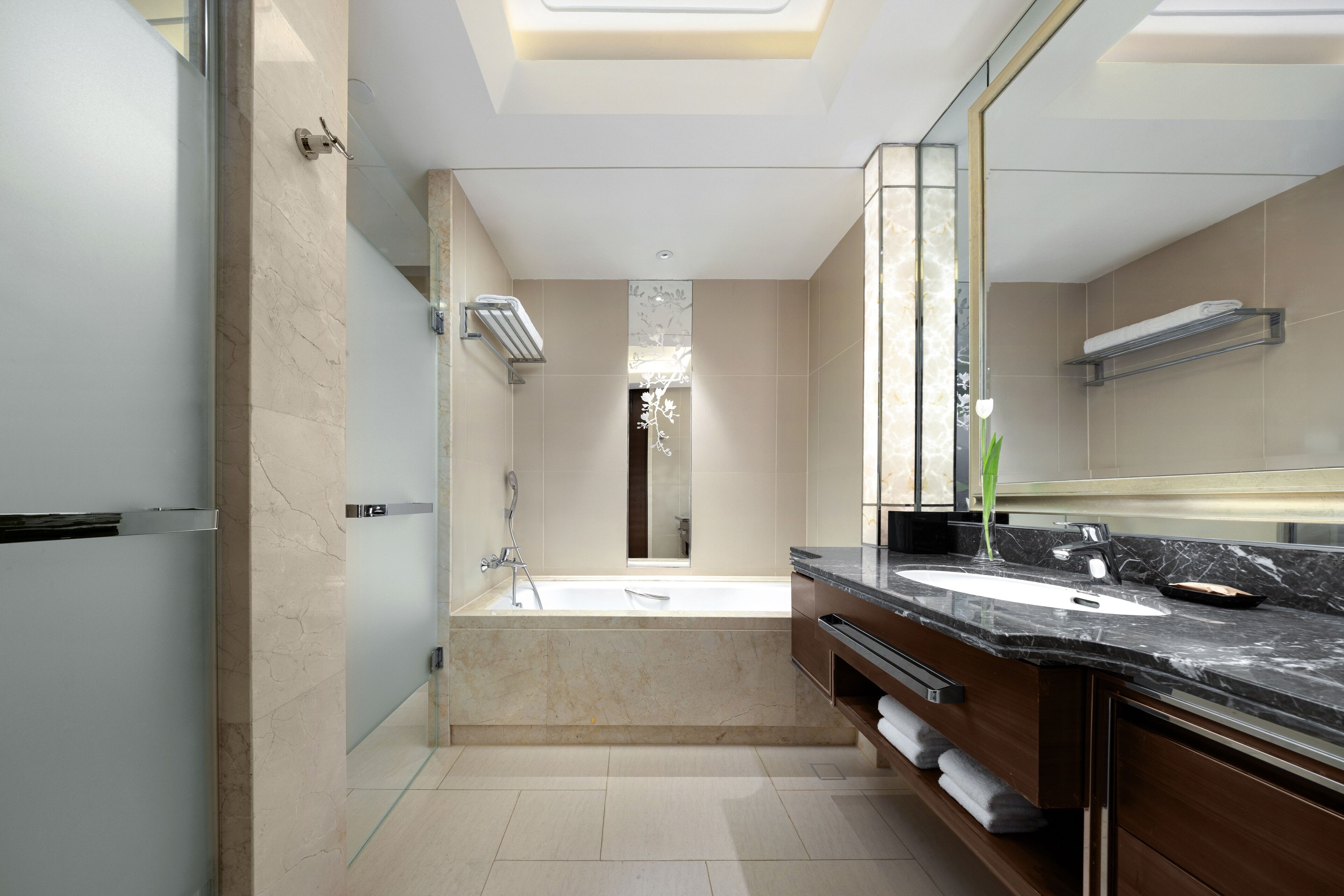 separate bathtub and shower, hair dryer, bathrobes, slippers