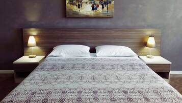 A hotel room with a large bed, two bedside lamps, and a painting on the wall.