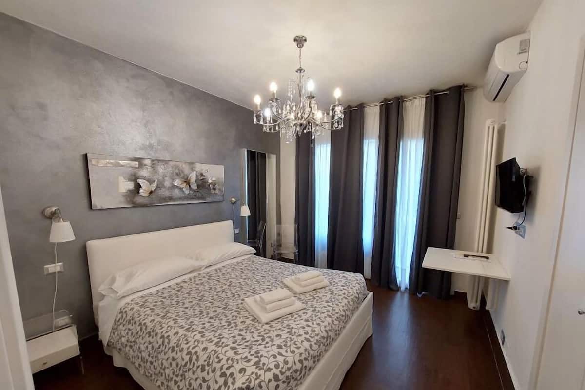 Triple Room, Garden View | Desk, cribs/infant beds, rollaway beds, free WiFi
