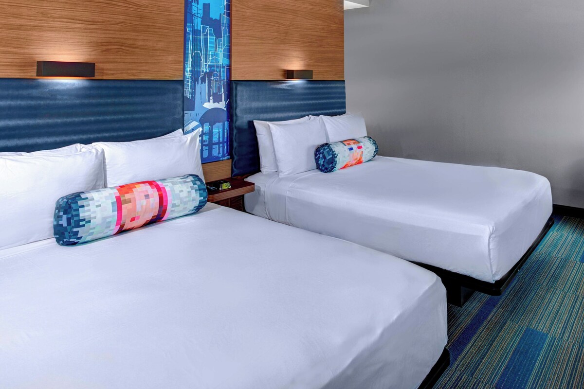 Premium bedding, in-room safe, desk, blackout drapes