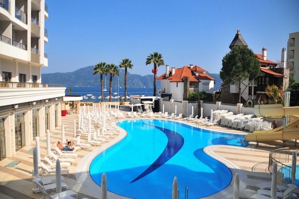 Indoor pool, outdoor pool, pool umbrellas, sun loungers