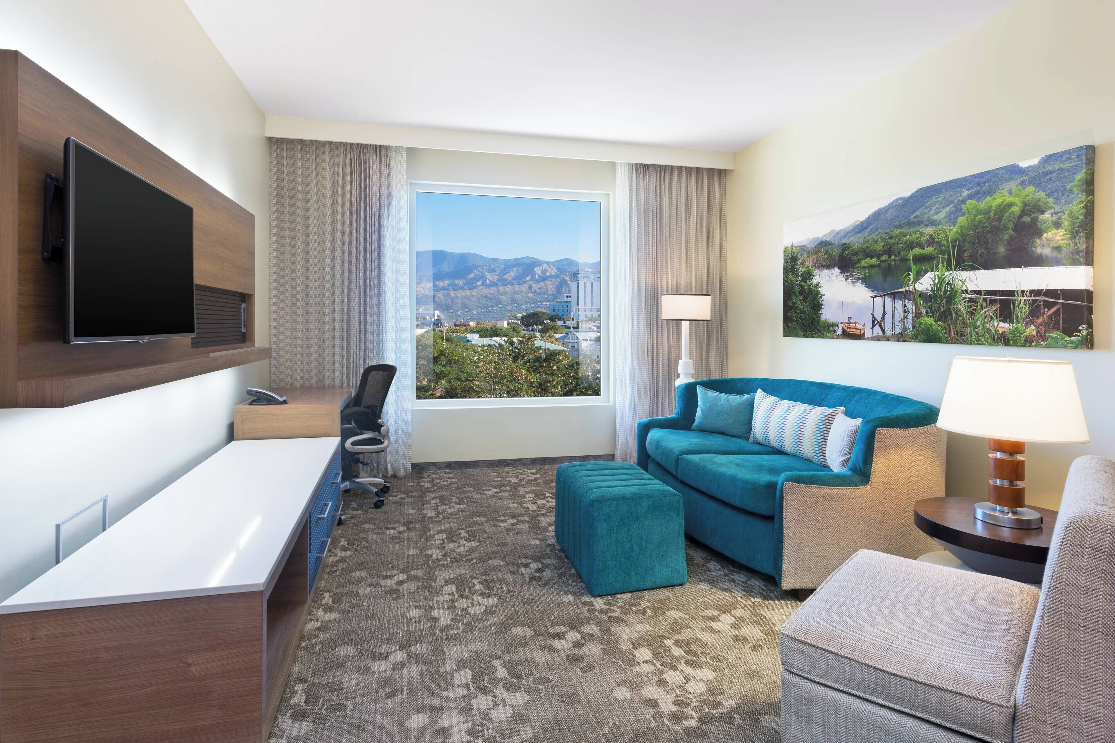 suite, 1 bedroom, non smoking | living area | 32-inch lcd tv with cable channels, tv, pay films