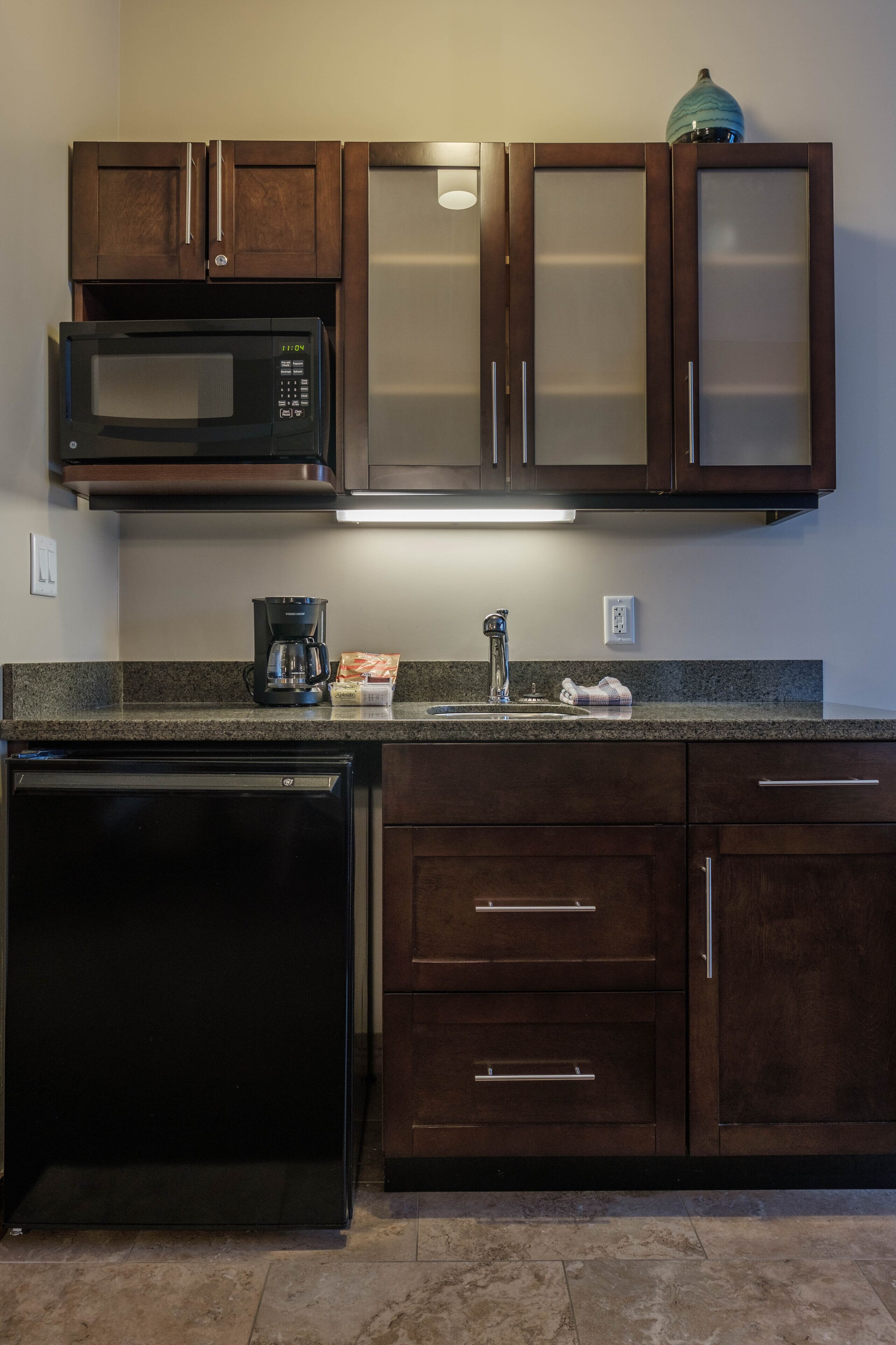 mini-fridge, microwave, coffee/tea maker, electric kettle