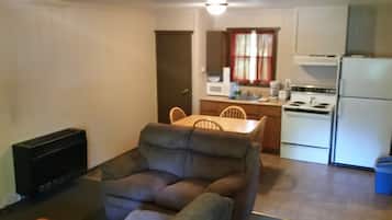 Deluxe Cabin, 2 Bedrooms | Private kitchen | Full-sized fridge, microwave, stovetop, coffee/tea maker