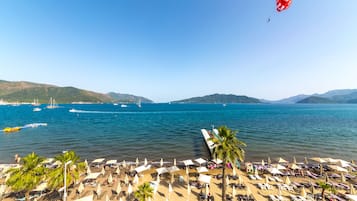 Private beach, sun loungers, beach umbrellas