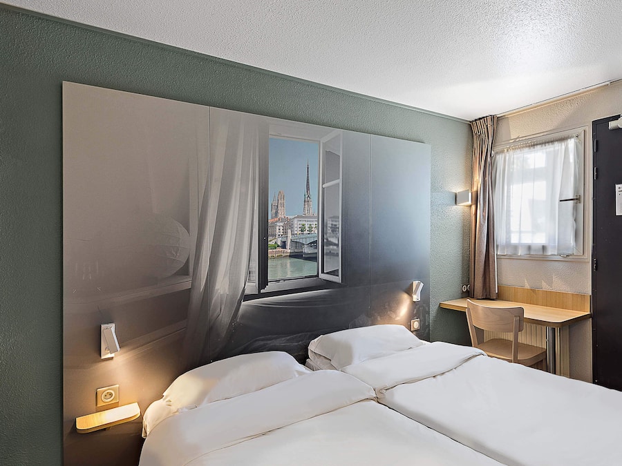 Roupas de cama premium, escrivaninha, quartos à prova de som