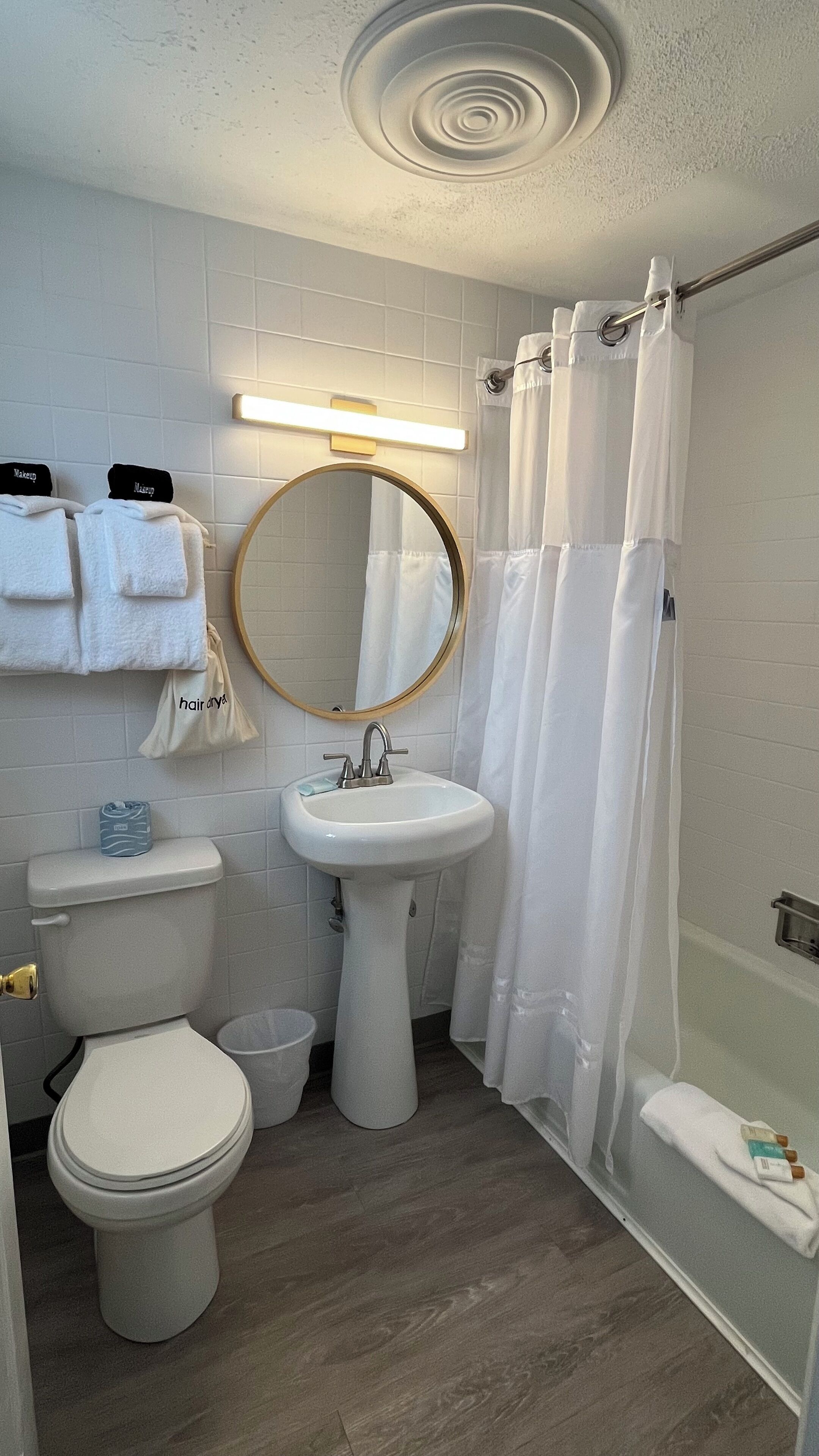 hair dryer, towels, soap, shampoo