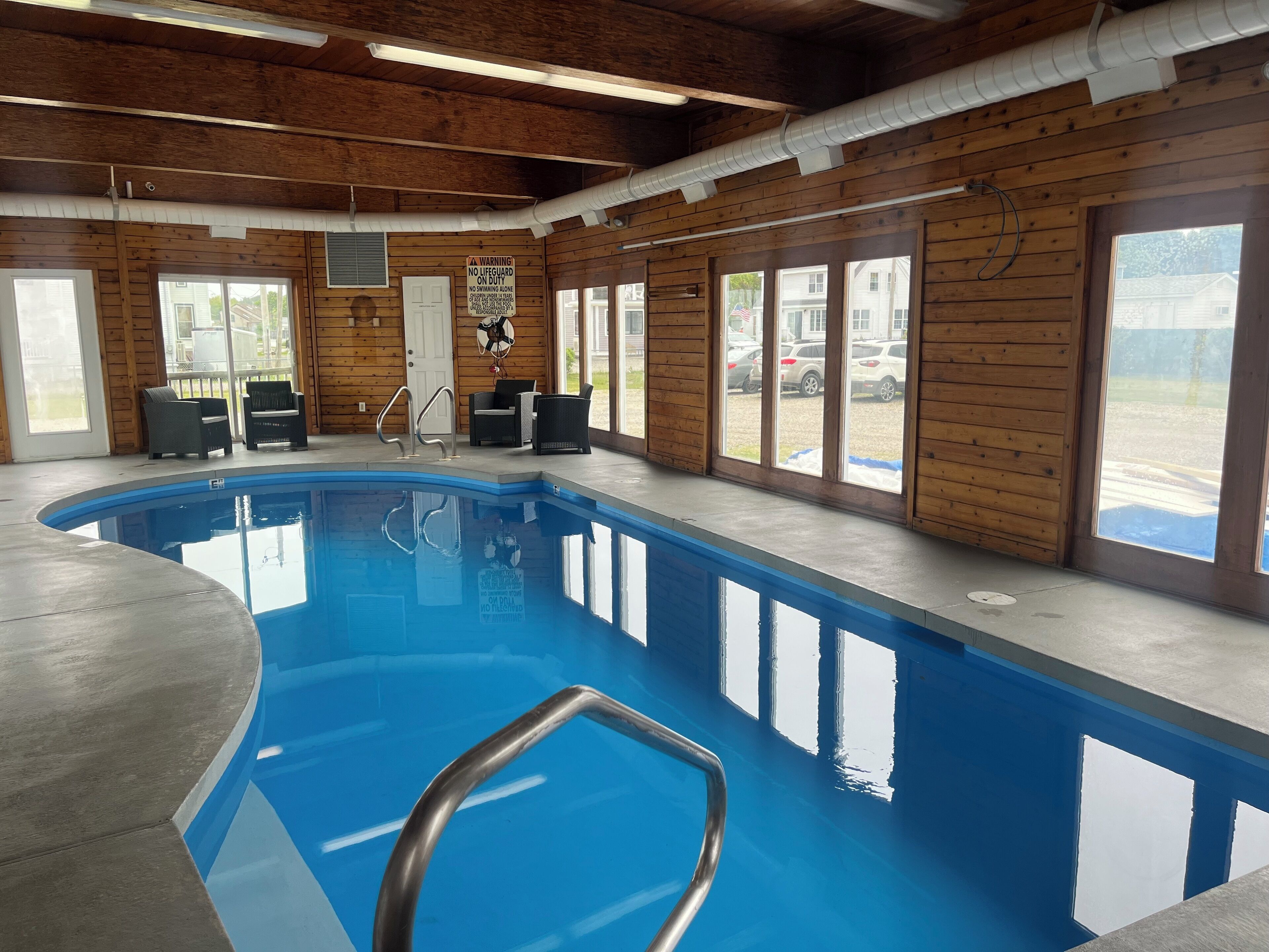 indoor pool, open 10:00 am to 9:00 pm, pool loungers