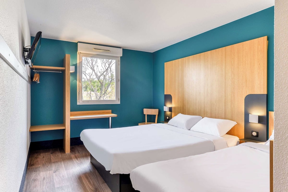 Chambre Triple, non-fumeurs | Literie de qualité supérieure, bureau, chambres insonorisées