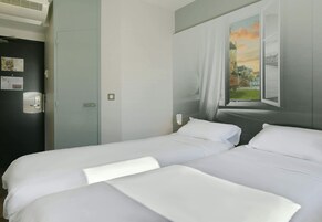 Chambre avec lits jumeaux | Bureau, chambres insonorisées, Wi-Fi gratuit, draps fournis