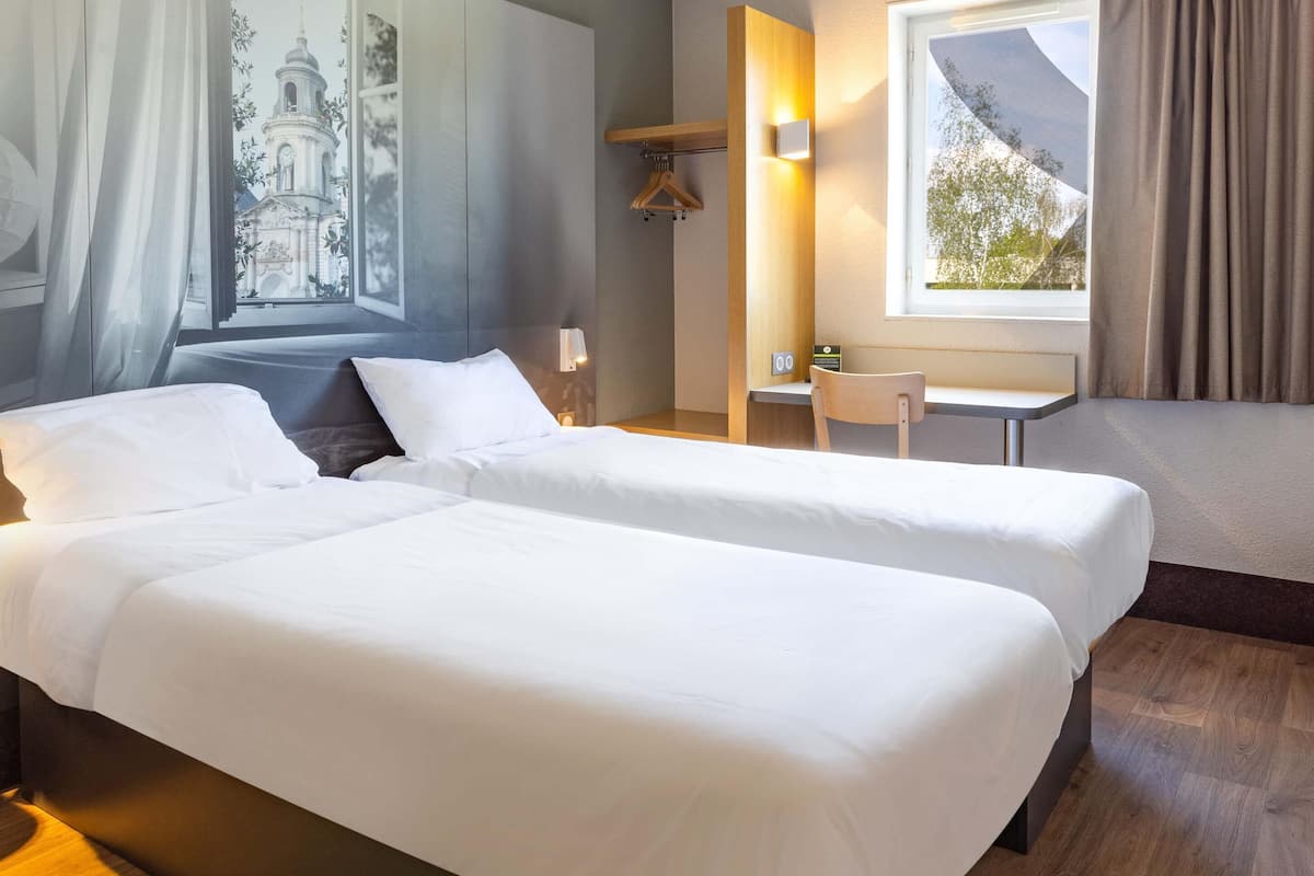 Chambre avec lits jumeaux, non-fumeur | Literie de qualité, bureau, système d’insonorisation