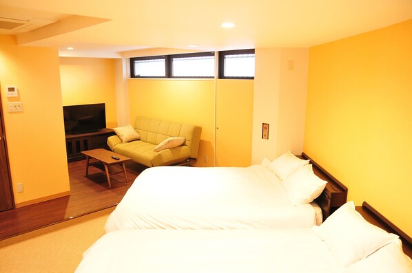 Twin Room | Down comforters, desk