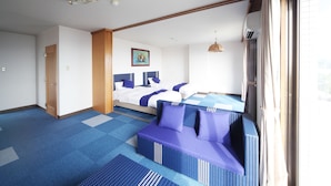 A hotel room with a large bed, a sofa, and a window with curtains. - Spa Inn Shirahama (Shirahama)